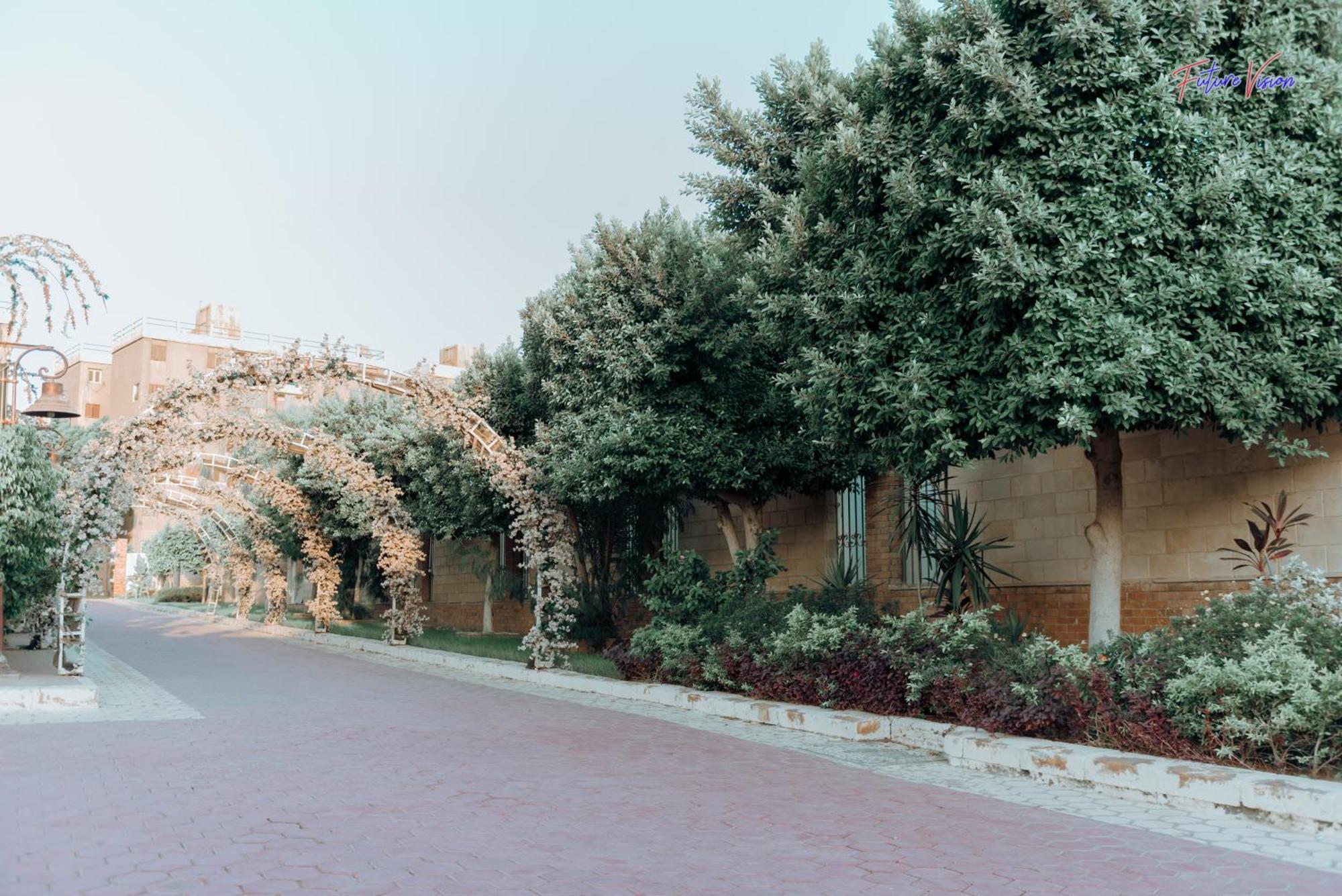 Rehana Plaza Hotel El El Cairo Exterior foto The entrance to the garden