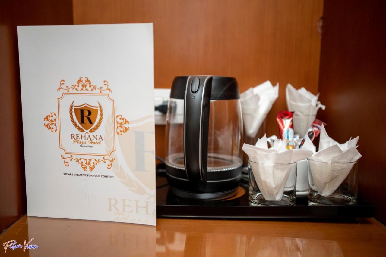 Rehana Plaza Hotel El El Cairo Exterior foto A tea and coffee making facility in a hotel room