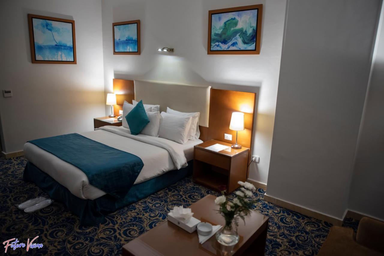 Rehana Plaza Hotel El El Cairo Exterior foto A room at the hotel